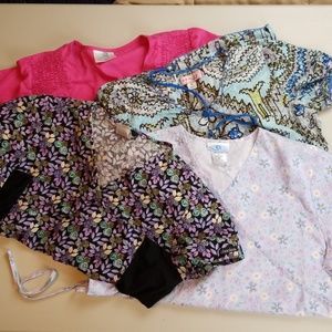 Set of 4 womens scrub tops.   D